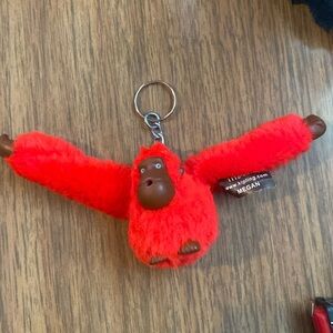 Kipling monkey keychain Megan red